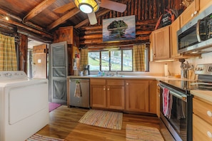 Fully equipped kitchen with washer,dryer. Dishwasher, microwave, electric stove.