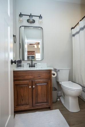 Bathroom includes full shower/tub and vanity, complete with shampoo, conditioner and body wash for your convenience.