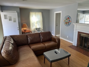 Furniture, Indoors, Living Room, Couch, Coffee Table