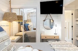 Bedroom TV; Bunk Beds; Bedroom Door to the rest of the Villa