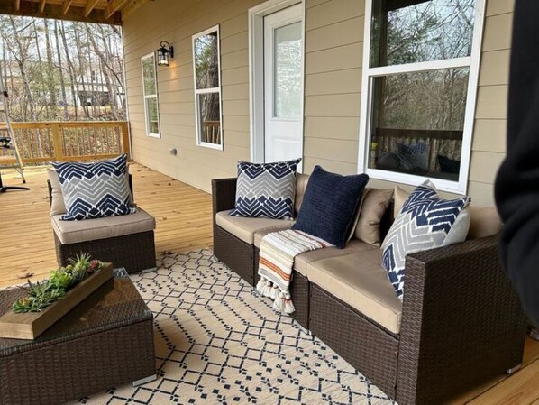 Lift the top off the outdoor coffee table for a cozy fire on the private deck.