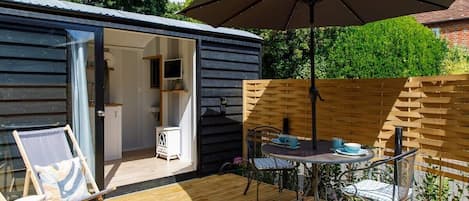Welcome to The Hut at Fieldfare! A cleverly designed shepherds hut with private decking.