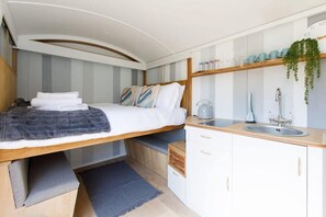 The Hut has a dining space that converts into a double bed!