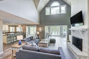 Open concept living room with great lake views. 