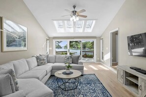 Beautiful mid-century home and plush couches to match.