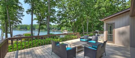 Expansive outdoor deck with seating area.