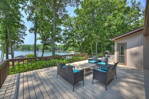 Expansive outdoor deck with seating area.