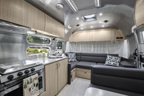 Relax in this chic living room in the Airstream.