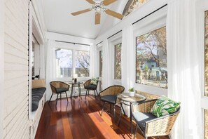 Additional sunroom seating area off the living room, perfect spot for your morning coffee!