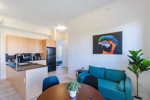 Living room, kitchen and dining area