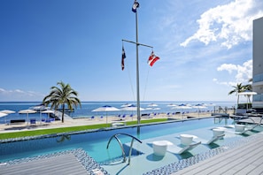 The resort's pool features a baja shelf with submersed ledge loungers. It's also heated so the water temperature is always perfecto.