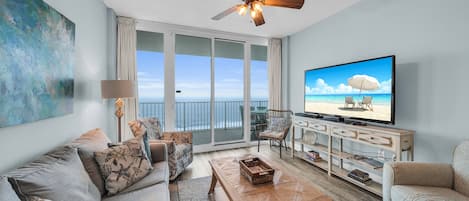 Living room with Gulf view and access to balcony