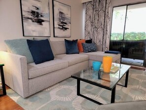 K0380 - Living room to patio - new couch and art