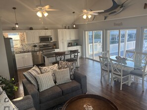 Open concept living/dining/kitchen so you never miss out on the fun.