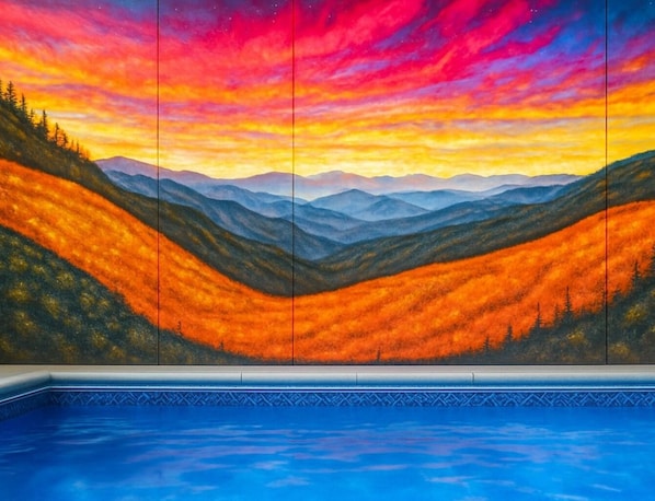 Welcome to Firefly Bliss - a modern luxury 6 bedroom cabin with a GRAND indoor heated pool and with stunning mountain views to bring the entire group together!