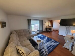 Large living room with Disney+ and HULU