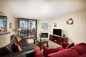 living room with queen and single sleeper sofa,  balcony ocean views