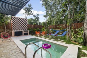 lounge or dine in our lovely pool area