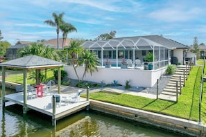 Enjoy The Beautiful Pool Overlooking The Canal or Bring Your Boat & Secure To The Boat Dock