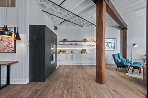 Heigh ceilings, Exposed wooden beams, Contemporary lighting...