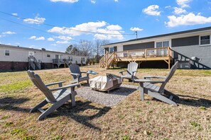 Gather around a crackling firepit, under a blanket of stars, sharing stories and roasting marshmallows with loved ones creates a cozy and memorable outdoor experience.