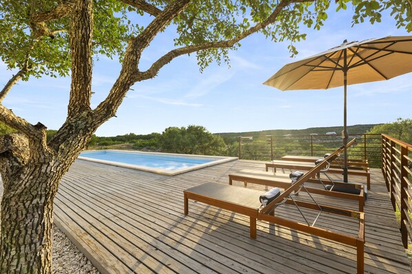 Private pool with lounge area and west facing views!