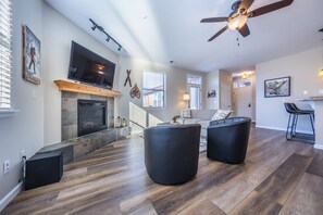 Living room - Living room with sleeper sofa, fireplace and large LED smart TV