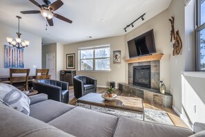 Livingroom - Living room with sleeper sofa, fireplace and large LED smart TV