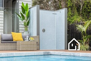 Outdoor hot water shower to rinse off post swim or after a day at the beach