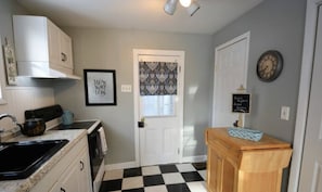 kitchen, half bath on right thru door