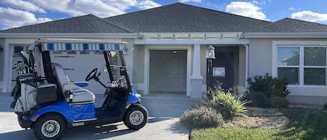 House with a golf cart