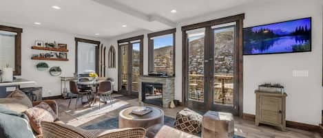 Boasting impressive views over the mountain & downtown, an open layout, and 2 outdoor spaces, this home is an ideal retreat to relax after a fun day out exploring.