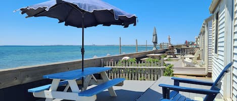 Exclusive-use deck with picnic table, gas grill and Adirondack chairs