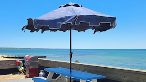 Exclusive-use deck with picnic table, gas grill and Adirondack chairs