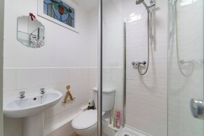 Full Bathroom:
- Sink
- Toilet
- Shower
- Clean towels
