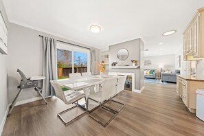 Elegant dining space with a high chair. 