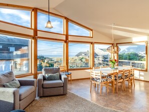 Across the street from the beach. OCEAN VIEW Open dining and living space.Table seats 8-10,  Woodstove, Smart TV for Streaming, large couch.