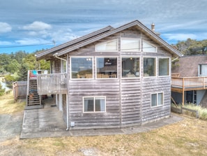 Front view. Steps to the beach just across the street.