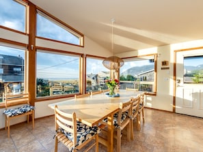 Across the street from the beach. OCEAN VIEW Open dining and living space.Table seats 8-10,  Woodstove, Smart TV for Streaming, large couch.
