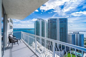 Private balcony with city & ocean views.
