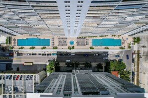 View of the 2 outdoor pools and hot tub.