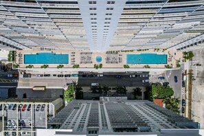 View of the 2 outdoor pools and hot tub.