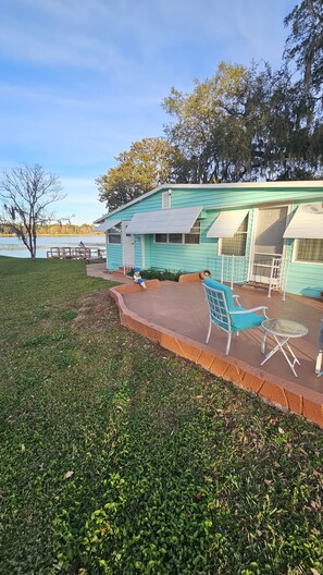 Side of house, front door and twin bedroom door in pic
