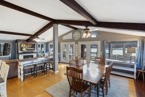 Main floor dining also offers 4 extra bar areas and the porch for more seating.