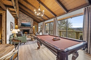 The upper level of the cabin is full of opportunities for relaxation and fun. 