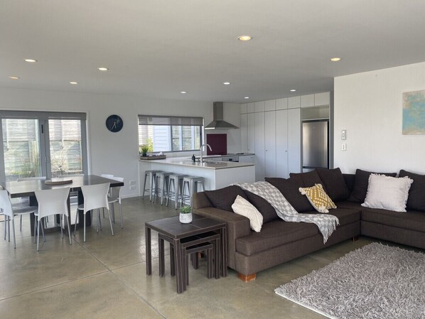 Open plan kitchen, dining and lounge areas