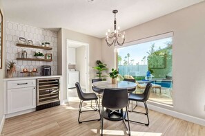 WIne Bar and Breakfast Nook with Pool View