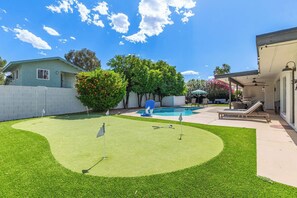 Custom 5 hole putting green for practicing your short game or challenging your friends. 