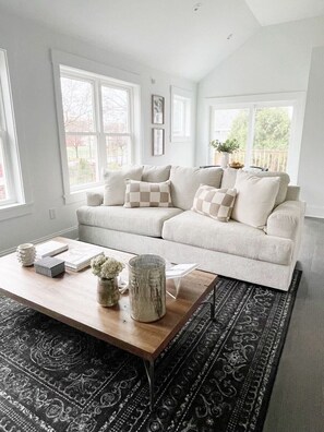 Unwind in style! Our living area is the perfect blend of comfort and chic. Your stylish escape awaits—come make yourself at home! ✨ #UrbanRetreat"