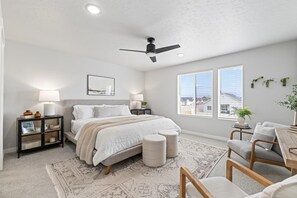 Indulge in comfort in our primary bedroom sanctuary!  Sink into luxury in a King size memory foam mattress, surrounded by plush bedding, catch a movie on the 50" Smart TV.  Enjoy a perfect night's sleep with the sound machine. 